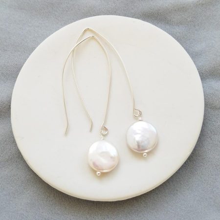 Handmade long dangle coin pearl earrings by Carrie Whelan Designs