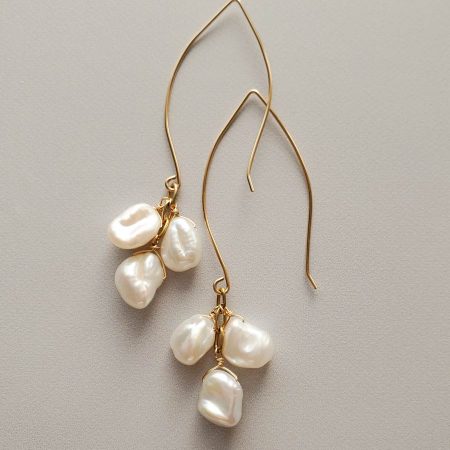 Long pearl earrings in gold handmade by Carrie Whelan Designs