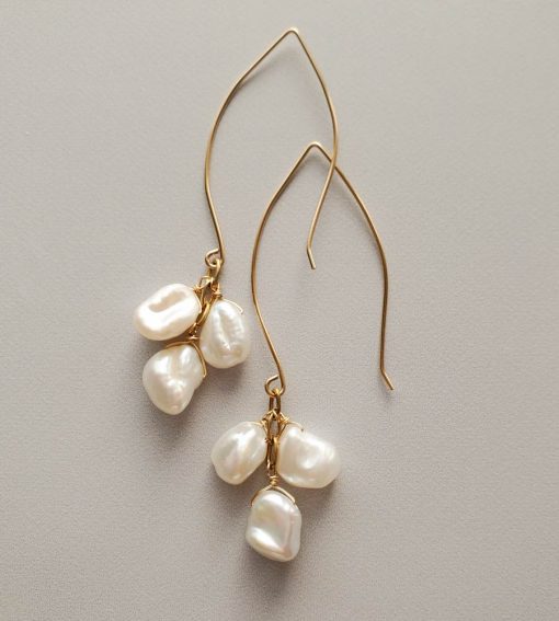 Long pearl earrings in gold handmade by Carrie Whelan Designs