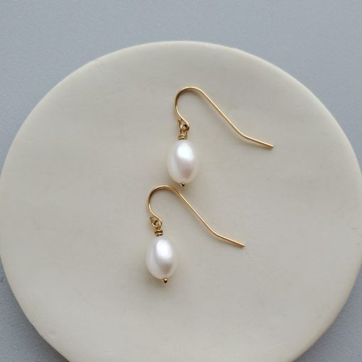 Dainty pearl earrings in gold fill by Carrie Whelan Designs