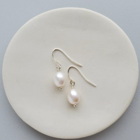 Dainty pearl earrings in sterling silver by Carrie Whelan Designs