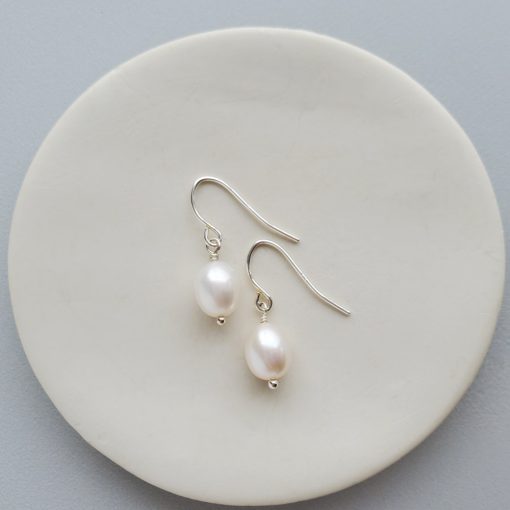 Dainty pearl earrings in sterling silver by Carrie Whelan Designs