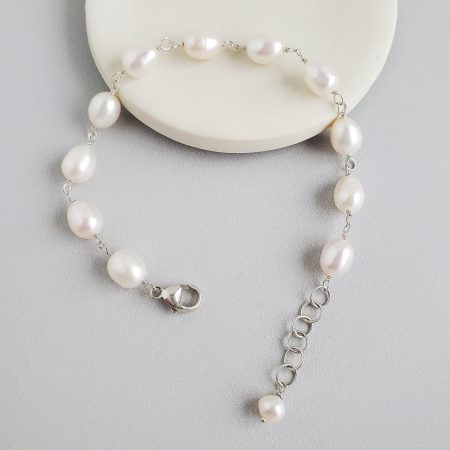 Adjustable freshwater pearl bracelet hand wrapped by Carrie Whelan Designs