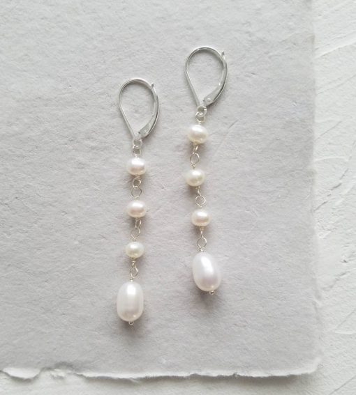 Linear pearl drop earrings handmade by Carrie Whelan Designs