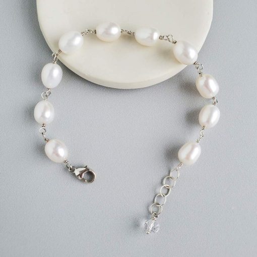 Handcrafted sterling silver and freshwater pearl bracelet by Carrie Whelan Designs