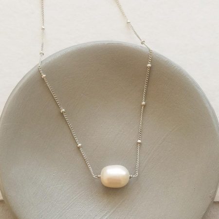 Single pearl choker necklace in sterling silver handmade by Carrie Whelan Designs