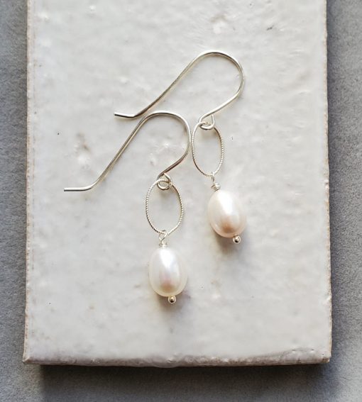 Oval pearl and silver earrings handmade by Carrie Whelan Designs