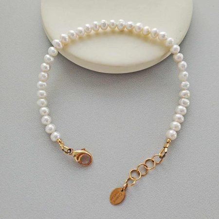 Dainty pearl bracelet in 14kt gold by Carrie Whelan Designs