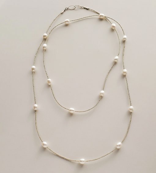 Long freshwater pearl strand necklace handmade by Carrie Whelan Designs