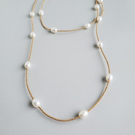 Long pearl seed bead necklace handcrafted in 14kt gold fill by Carrie Whelan Designs
