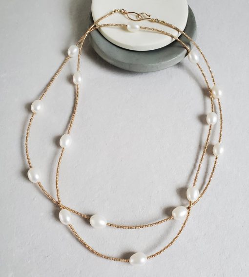 Long seed bead & pearl strand necklace handmade in 14kt gold fill by Carrie Whelan Designs