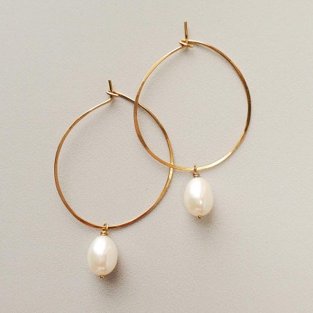 White freshwater hoops handmade in 14kt gold fill by Carrie Whelan Designs