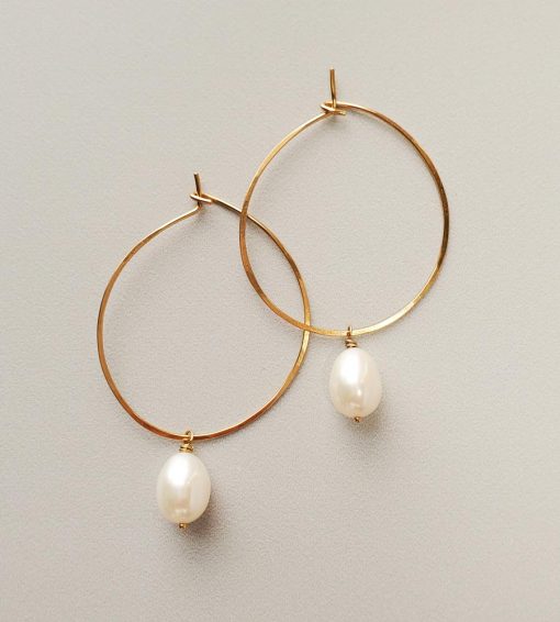 White freshwater hoops handmade in 14kt gold fill by Carrie Whelan Designs