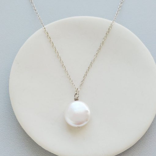 Freshwater coin pearl pendant in sterling silver handmade by Carrie Whelan Designs