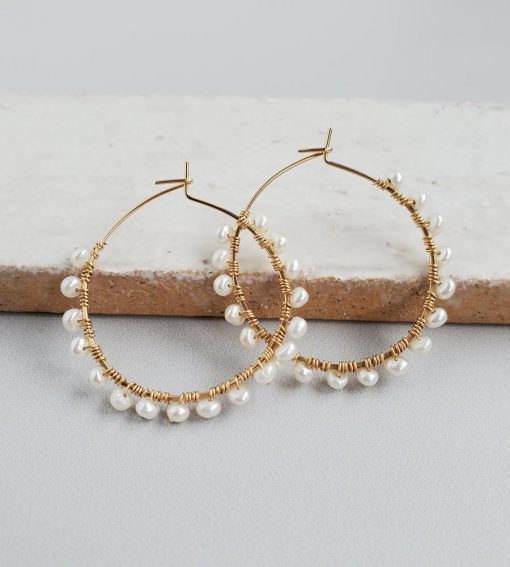 Freshwater pearl wrapped hoop earrings handmade by Carrie Whelan Designs
