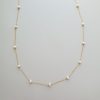 Pearl station gold necklace by Carrie Whelan Designs