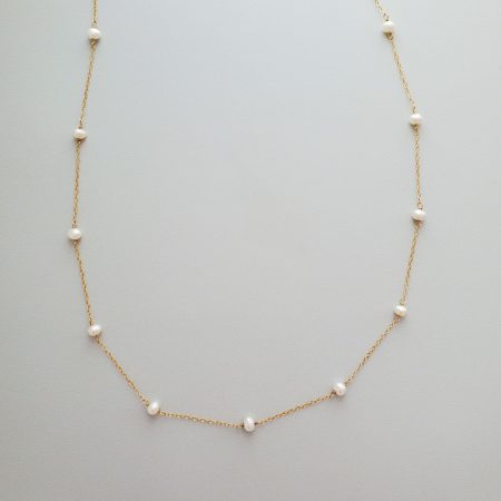 Pearl station gold necklace by Carrie Whelan Designs