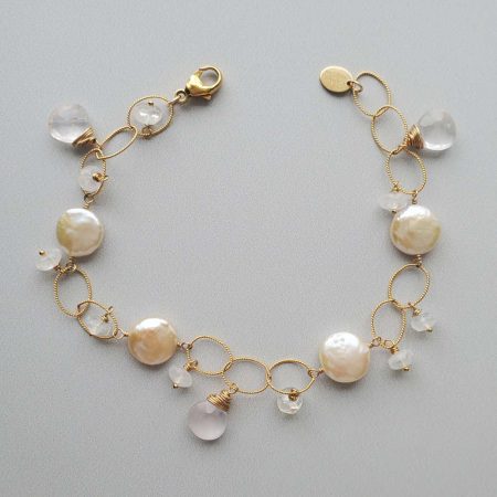 Pink coin pearl bracelet in gold by Carrie Whelan Designs