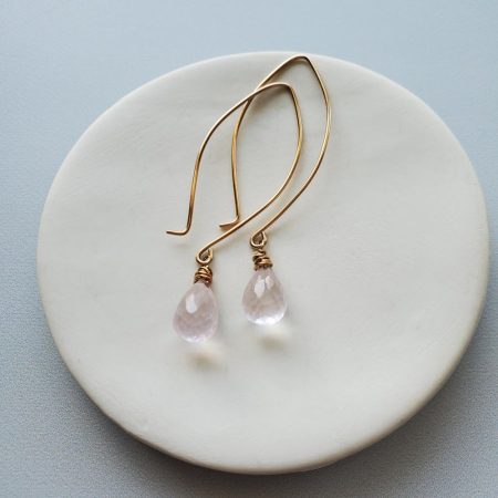 Rose quartz dangle earrings in gold handcrafted by Carrie Whelan